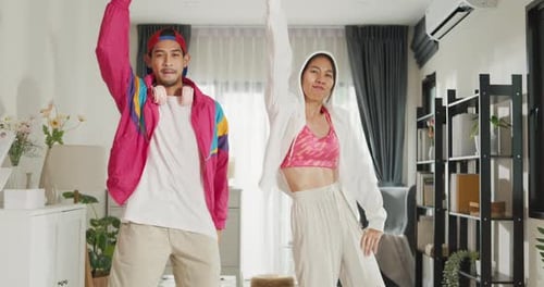 Couple Dancing Together in Living Room