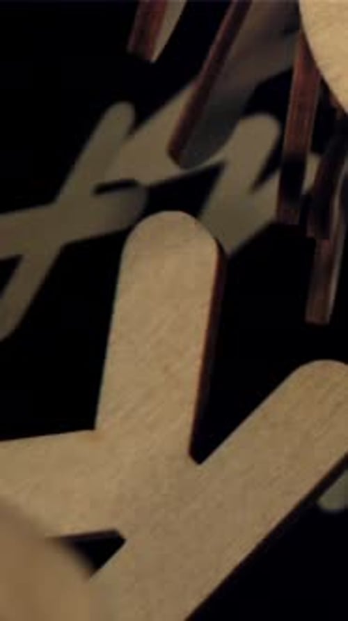 The Fall of Wooden English Letters Filmed on a Highspeed Camera at 1000 Fps