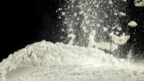 Flour Falls on the Kitchen Table Filmed on a Highspeed Camera at 1000 Fps