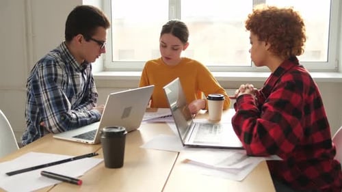 Team at Work Office Meeting Group of Young Business People Working Together in Creative Office Happy