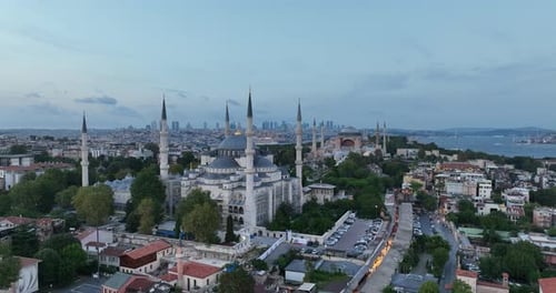 Establishing Orbiting Aerial Drone Shot of a Hagia Sophia Holy Grand Mosque with Bosphorus Bridge