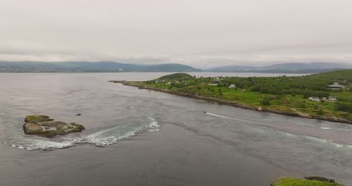 Tourist boats explore strong tidal current of Saltstraumen, Bodø, Norway. Aerial