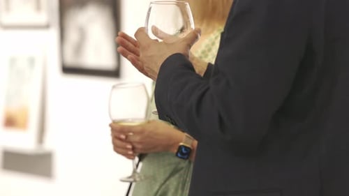 Successful People Holding Wine Glasses at the Event
