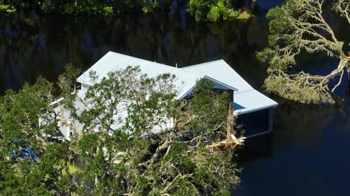 Surrounded By Hurricane Ian Rainfall Flood Waters Home in Florida Residential Area