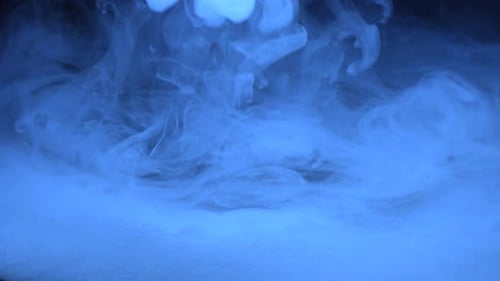 Blue Smoke Cloud in Dark Background