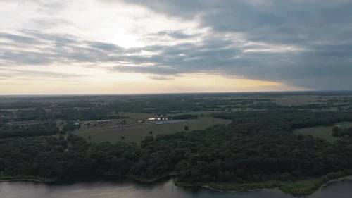 Dense Vegetations Surrounding Flint Creek Lake In Gentry, Arkansas, United States. Aerial Drone Shot