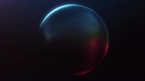 A smooth glowing sphere in red and blue gradient tones rotates in darkness