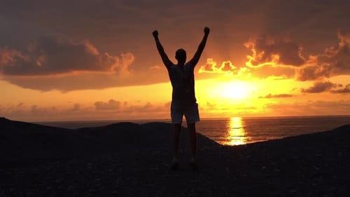 Silhouette Celebrates a Vibrant Ocean Sunset