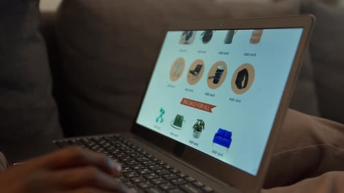 Browsing Online Store on Laptop at Home