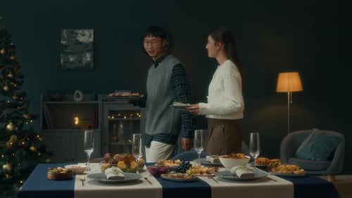 Friends Preparing Christmas Meal at Home