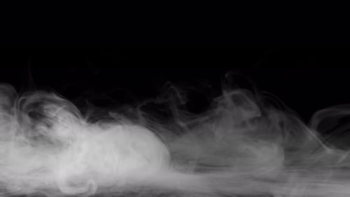 White Smoke Flowing on Black Background