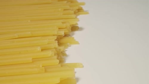Close Up of Raw Pasta on White Background Selective Focus