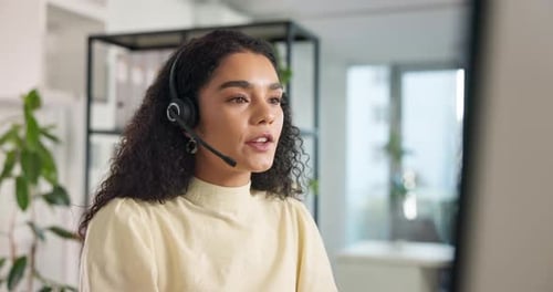 Business woman, consultant and talking with headset on mic at call center for online advice
