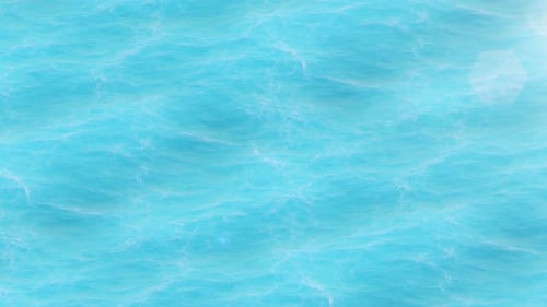 Seamless loop footage with the blue waves splashing at the pacific ocean