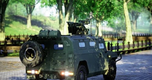 Military Vehicle Parked in a Sunny Park Surrounded By Lush Greenery