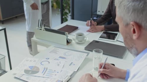 Medical Team Meeting in Office Setting