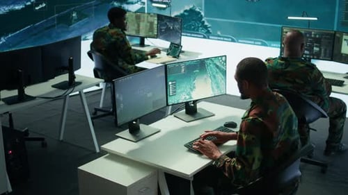 Military Experts in Mission Control Center Use Modern Technology on Computer