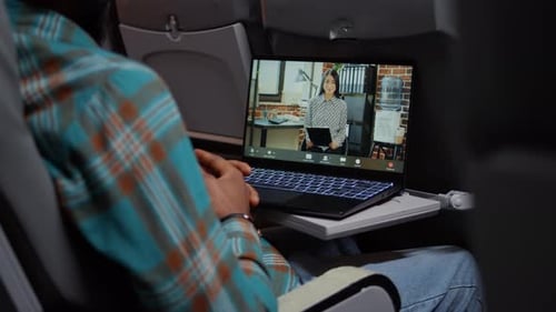 Male Freelancer Using Remote Videocall Telework to Chat with Woman