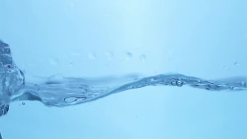 Abstract Liquid Ripple. Crystal Clear Water Creating Smooth Patterns on a Clean Surface.