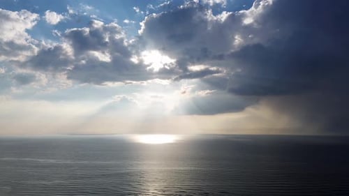 Beautiful sunset over the sea, ocean. Top view from a quadcopter. Beautiful flight.