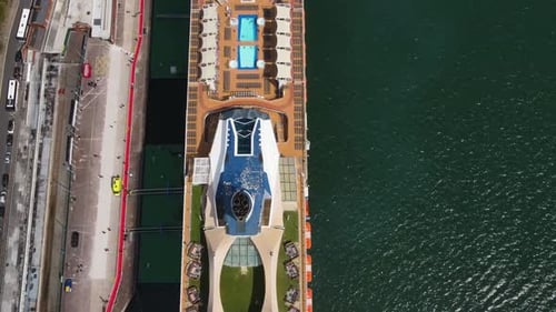 Drone Flies Over the Deck of a Cruise Ship in the Port of Cobh Ireland