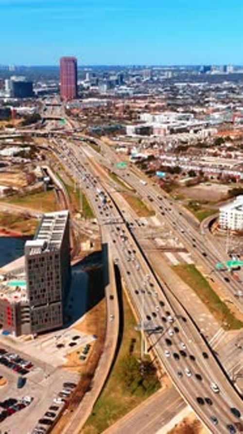 Lively traffic on the highways of American uptown at daytime.