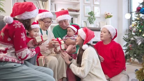 Family Celebrating Christmas Together in Cozy Home