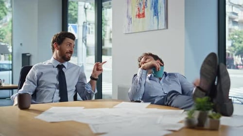 Office Break Couple Talking Together Drinking Coffee at Light Cabinet Closeup