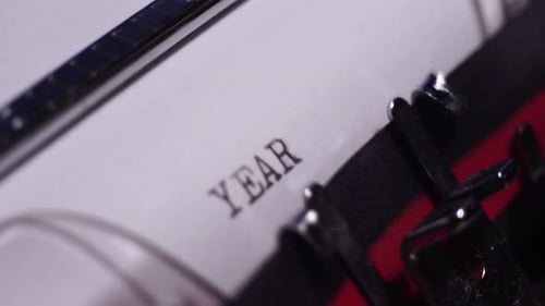 Year 1933, Typing on Blank White Paper in Vintage Typewriter, Close Up
