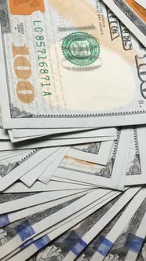 Pile of One Hundred Dollar Bills
