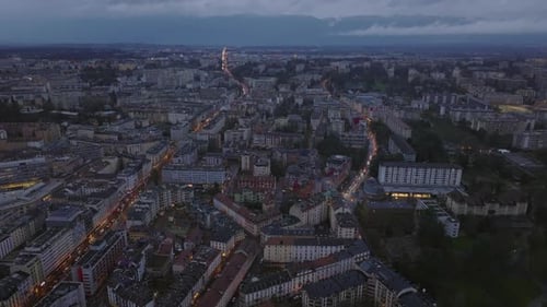 Forwards Fly Above Streets and Buildings in Residential Urban Neighborhood Aerial Panoramic View of
