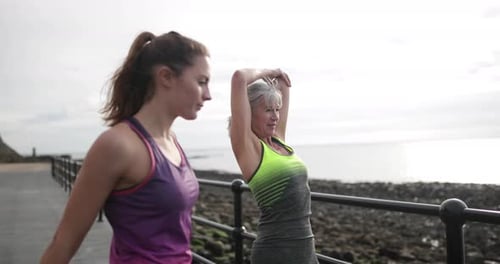 Generations of women warming up before a run