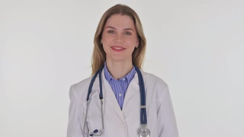 Portrait of Smiling Female Doctor on White Background