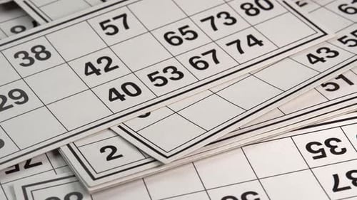 Close Up of Bingo Cards with Numbers
