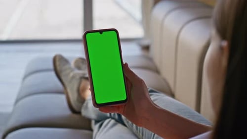 Woman Relaxing with Phone with Green Screen
