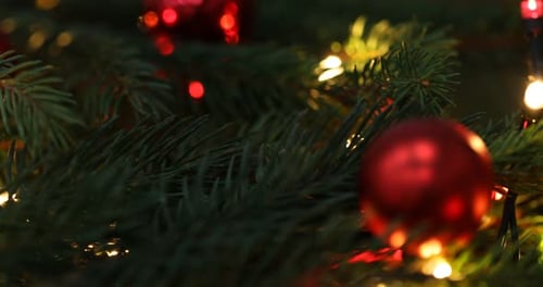 Festive Christmas Tree Decoration with Lights and Ornaments