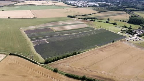 Aerial view orbiting above Hitchin lavender fields rural fragrant agriculture meadow countryside