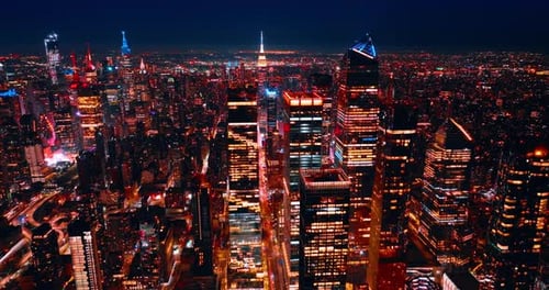 Splendid scenery of New York at night. Luminous panorama of Big Apple from drone footage.