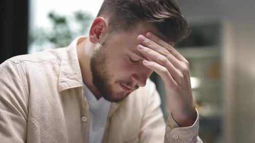 Man Feeling Headache