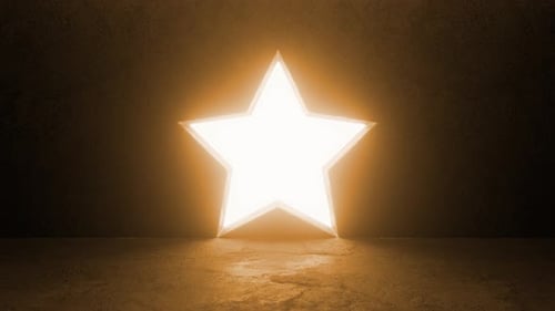 Étoile brillante s'ouvrant dans une pièce sombre, révélant une lumière blanche
