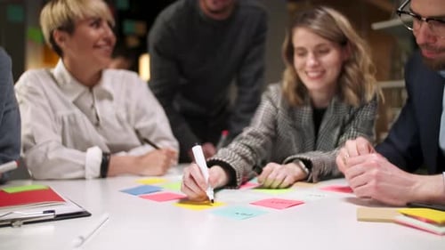 Team Brainstorming Ideas Together at the Office