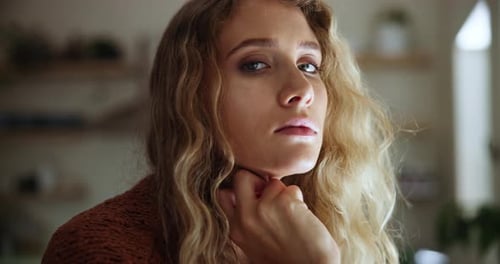 Woman, face and depressed in home thinking alone of memory or stress of fatigue or overwhelmed