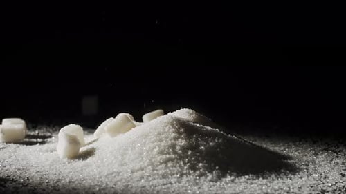 Cascading Sugar Cubes on Granulated Pile 4k