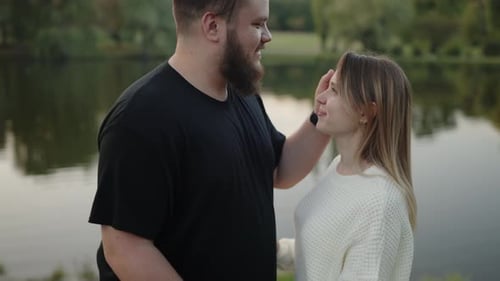 Romantic Couple Enjoying a Peaceful Moment By the Lake