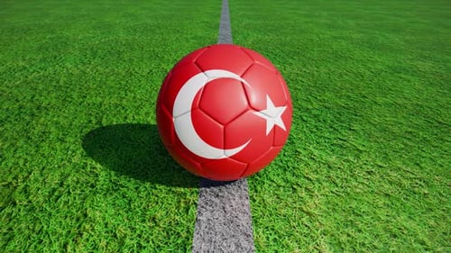 Rotating Footballs with National Flags on a Green Field