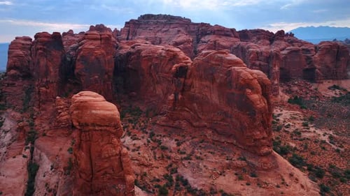Flight around the stunning red rocks in the dry desert.