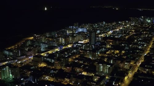 Aerial drone footage of night time traffic in Cape Town, South Africa