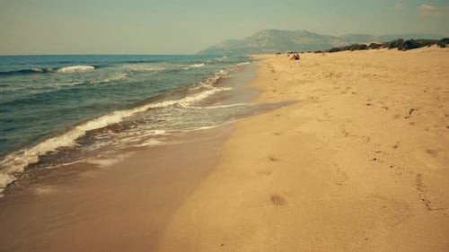 Sea Waves Washing Sandy Beach