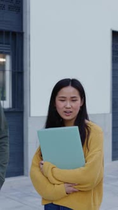 Group of Happy Asian Students Walking at College Campus