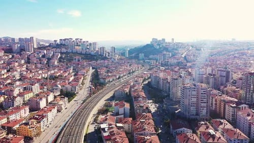 train tracks passing through the city and drone arc movement